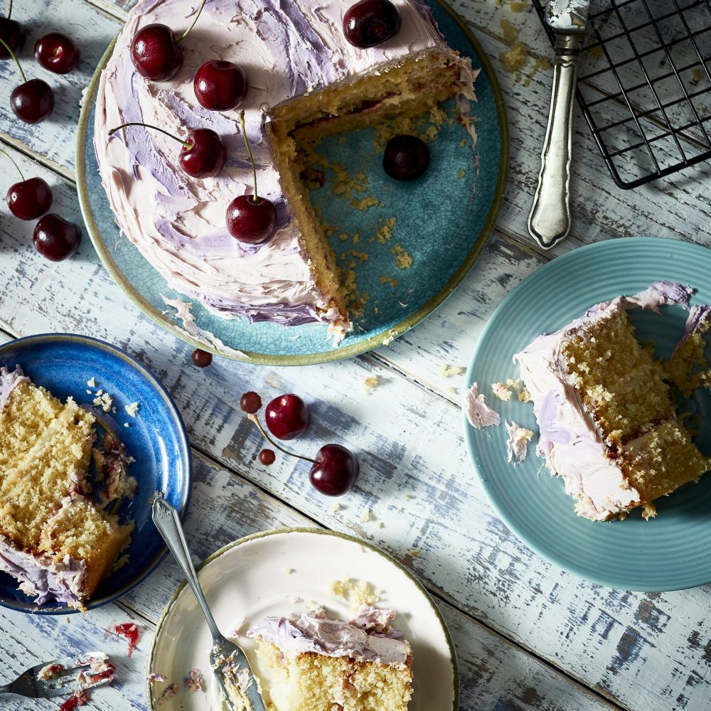 birds eye view of various cakes on different sizes plates