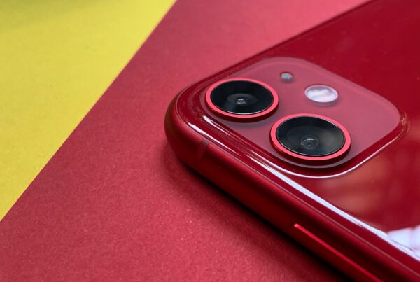 red coloured mobile phone